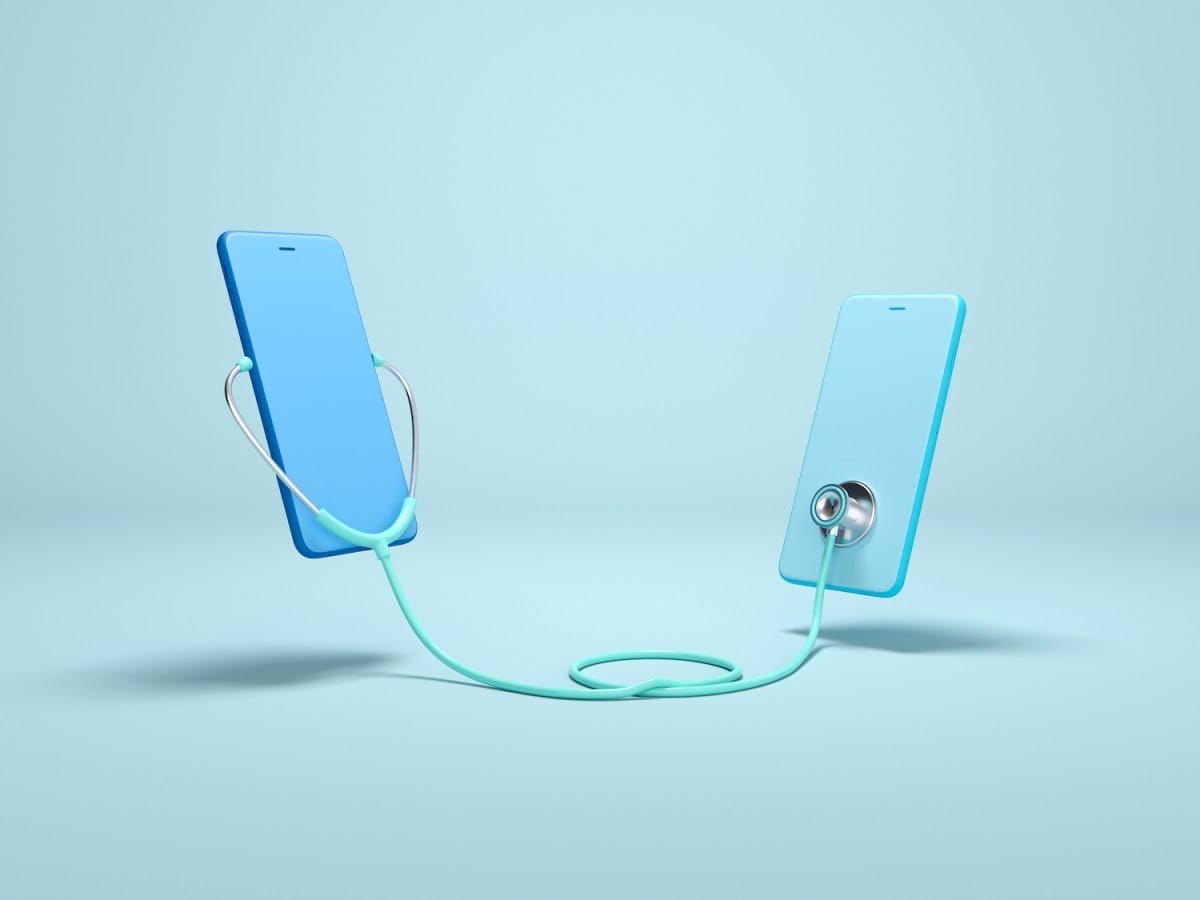 Doctors discussing the use of artificial intelligence in healthcare, showing support for AI as a tool to assist medical work while expressing caution about using chatbots for giving health advice to patients.